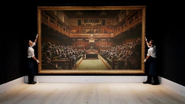 Banksy piece Devolved Parliament sells for record £9.8m at auction
 
Banksy piece Devolved Parliament sells for record £9.8m at auction