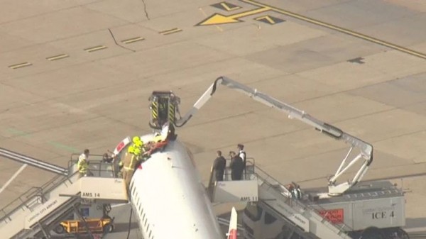 Extinction Rebellion protester climbs on plane at London City Airport
 
Extinction Rebellion protester climbs on plane at London City Airport