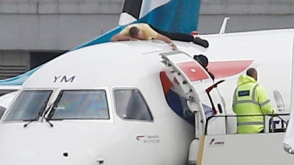 Extinction Rebellion protester climbs on plane at London City Airport
 
Extinction Rebellion protester climbs on plane at London City Airport