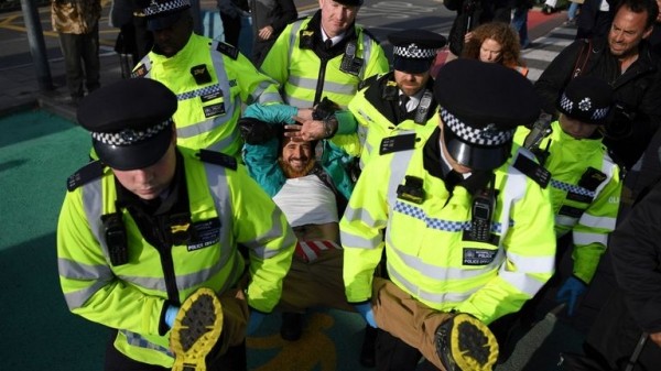 Extinction Rebellion protester climbs on plane at London City Airport
 
Extinction Rebellion protester climbs on plane at London City Airport