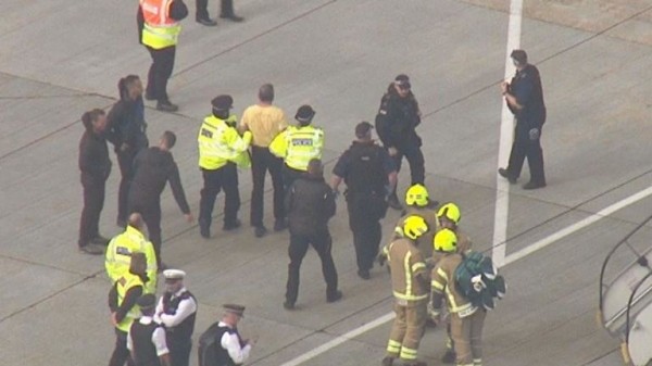 Extinction Rebellion protester climbs on plane at London City Airport
 
Extinction Rebellion protester climbs on plane at London City Airport