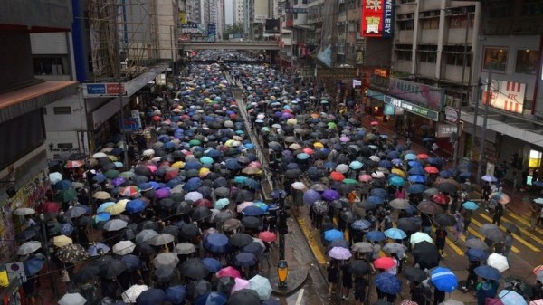 Hong Kong: Violence flares again as pro-democracy protesters defy mask ban
Hong Kong: Violence flares again as pro-democracy protesters defy mask ban