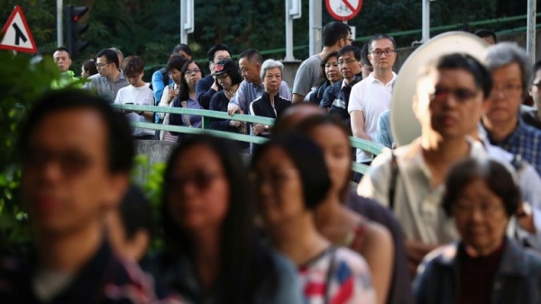 Hong Kong: Record turnout in elections seen as poll on pro-democracy protests
 
Hong Kong: Record turnout in elections seen as poll on pro-democracy protests