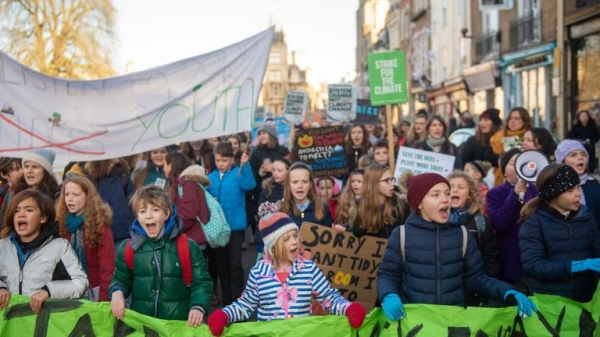 
Climate change: Thousands of children skip school to take part in protests
