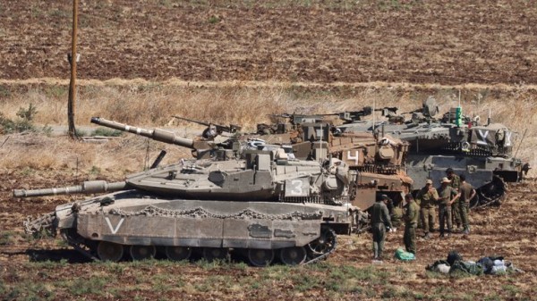 Tanks gather near Israeli-Lebanon border - as defence minister holds talks over 'expansion' of IDF activity  Tanks gather near Israeli-Lebanon border - as defence minister holds talks over 'expansion' of IDF activity