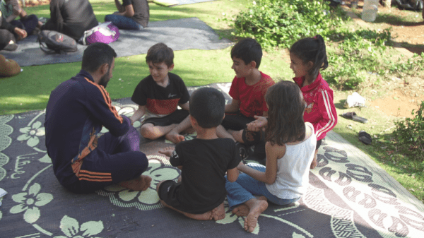 'I tell them it's fireworks': Families in Lebanon try to reassure children on the patches of grass they now call home 'I tell them it's fireworks': Families in Lebanon try to reassure children on the patches of grass they now call home