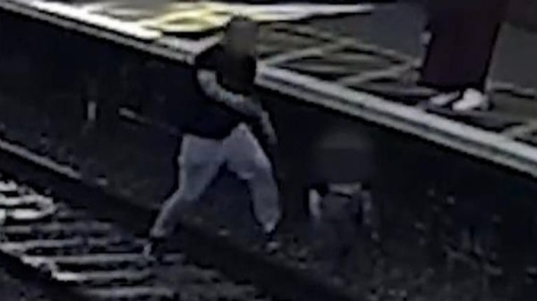 LNER releases footage showing moment child was rescued from rail track seconds before train passed through LNER releases footage showing moment child was rescued from rail track seconds before train passed through