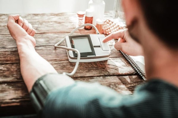 People might hold arms incorrectly for blood pressure tests