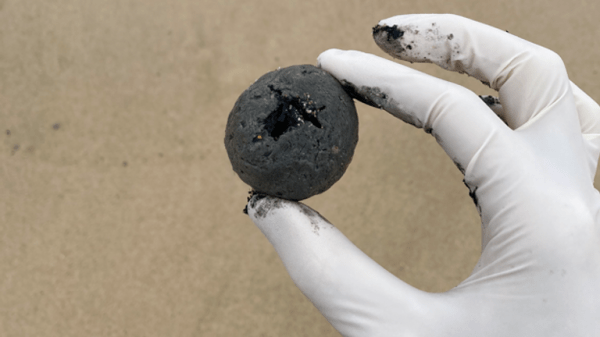Sydney beaches reopen as composition of 'mystery' balls revealed