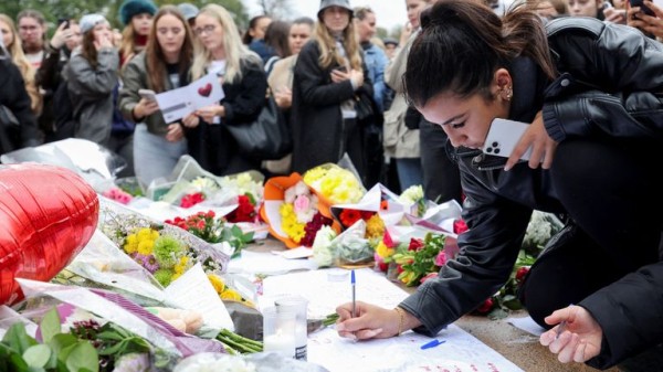 Tearful Liam Payne fans comfort one another at London vigil Tearful Liam Payne fans comfort one another at London vigil