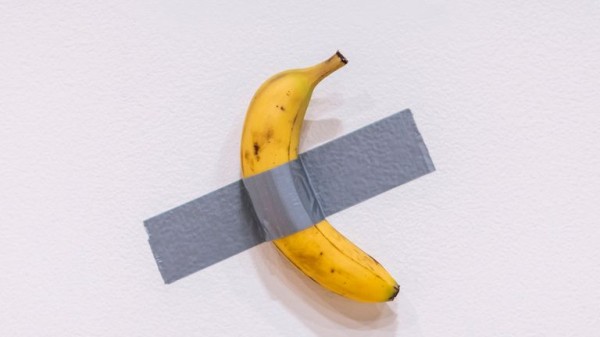 Man eats £4.9m banana artwork Man eats £4.9m banana artwork