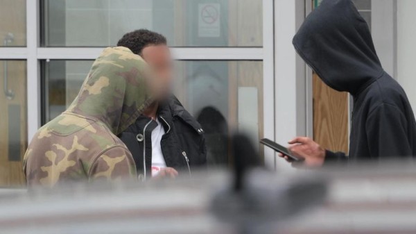 Residents hit out at 'information vacuum' over hotel used for asylum seekers - as migrants tell of traumatic journeys