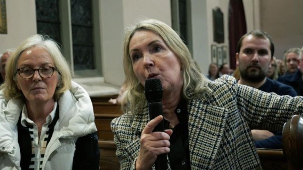 Residents hit out at 'information vacuum' over hotel used for asylum seekers - as migrants tell of traumatic journeys