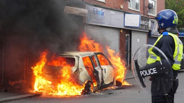 Police 'immensely brave' but forces were unprepared for summer riots, says report