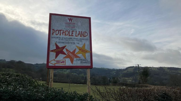 'Pothole Land': Residents of Wrexham village turn road into tourist attraction