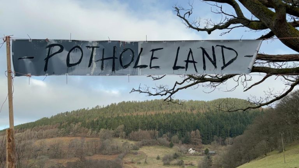 'Pothole Land': Residents of Wrexham village turn road into tourist attraction