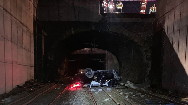 Major travel disruption in Manchester after car crashes onto railway lines - driver arrested Major travel disruption in Manchester after car crashes onto railway lines - driver arrested