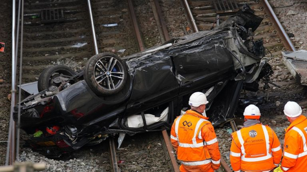 Major travel disruption in Manchester after car crashes onto railway lines - driver arrested Major travel disruption in Manchester after car crashes onto railway lines - driver arrested