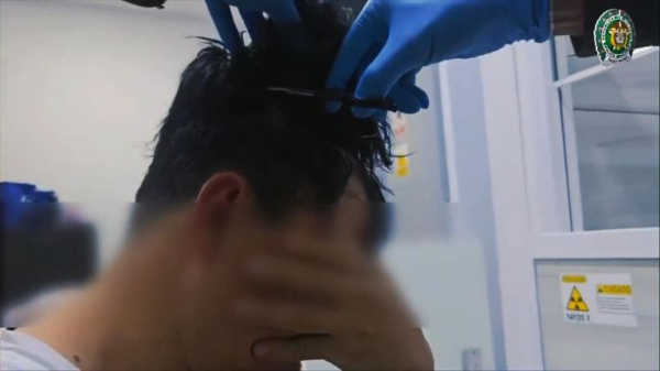 Man caught trying to smuggle cocaine under a wig in Colombia 