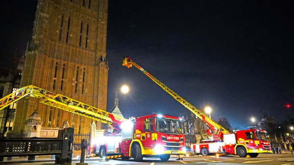 Man holding Palestinian flag who climbed up Elizabeth Tower comes down Man holding Palestinian flag who climbed up Elizabeth Tower comes down