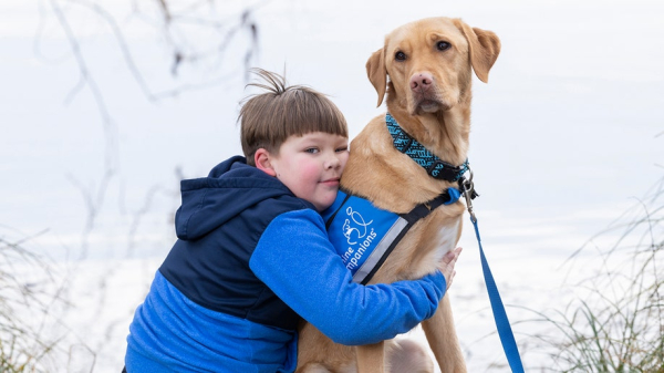 Kids with autism supported by service dogs, as research and families note 'incredible changes'