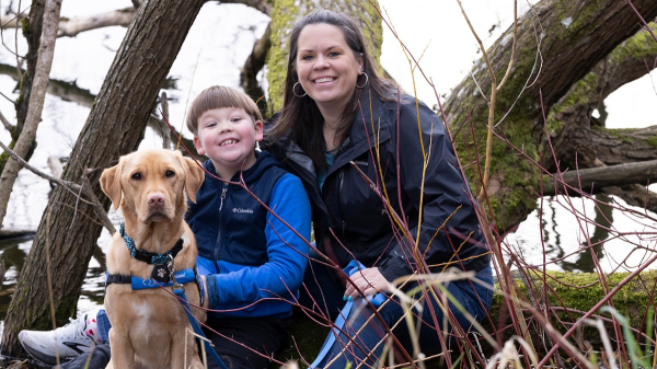Kids with autism supported by service dogs, as research and families note 'incredible changes'