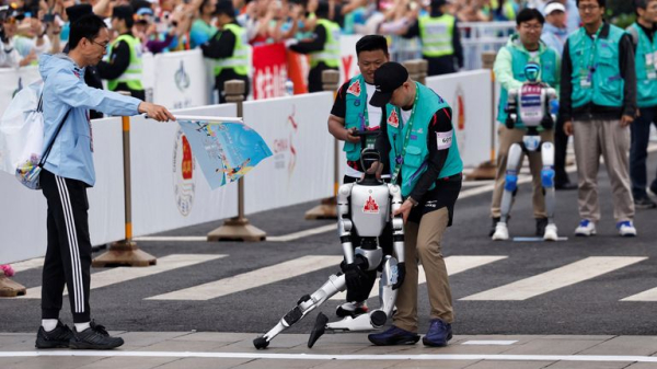 China hosts world's first half-marathon race between humans and robots