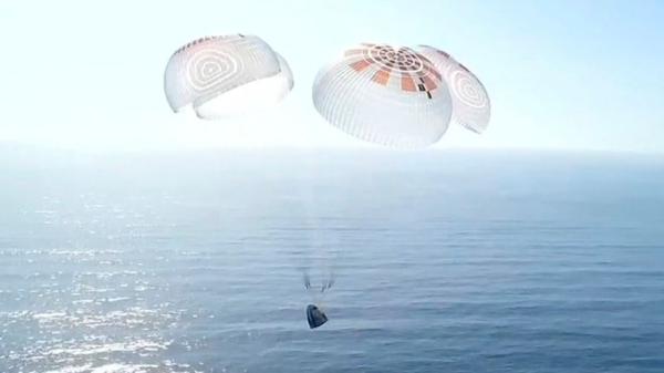 SpaceX tourists return to Earth after historic flight