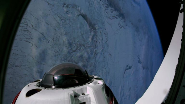 SpaceX tourists return to Earth after historic flight