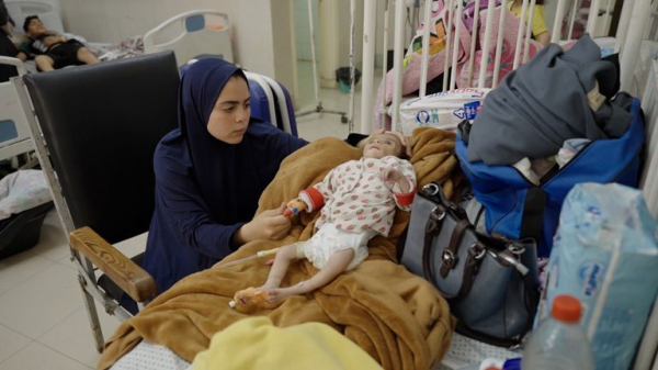 Palestinians flock to Gaza aid centres despite concerns - as lawyers call for sanctions on Israel