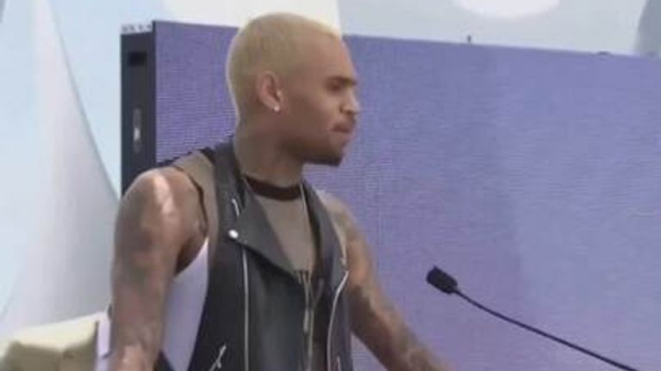 Rapper charged with GBH - after singer Chris Brown remanded in custody over 'bottle attack' Rapper charged with GBH - after singer Chris Brown remanded in custody over 'bottle attack'