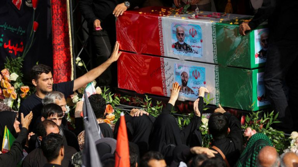 Chants of 'death to America' at funeral for Iranian military commanders and scientists Chants of 'death to America' at funeral for Iranian military commanders and scientists