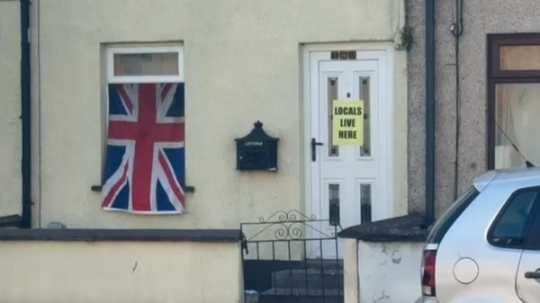 Why did Ballymena become the latest site of anti-immigration riots?