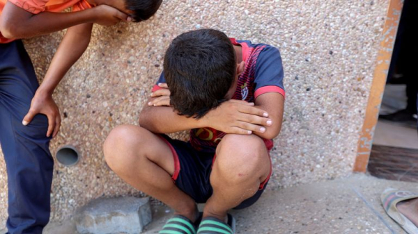 'At least 59 killed' in Gaza after Israeli military opens fire near aid centre and carries out strikes