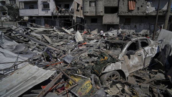 'At least 59 killed' in Gaza after Israeli military opens fire near aid centre and carries out strikes