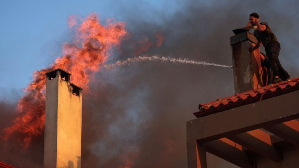 Firefighters tackle blazes as wildfires break out in Greece, Turkey and Albania Firefighters tackle blazes as wildfires break out in Greece, Turkey and Albania