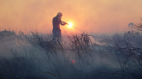 Firefighters tackle blazes as wildfires break out in Greece, Turkey and Albania Firefighters tackle blazes as wildfires break out in Greece, Turkey and Albania
