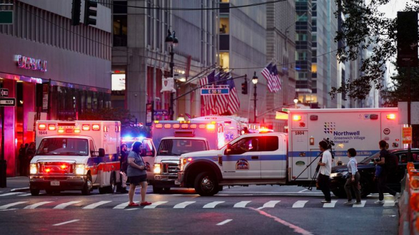 Gunman kills four including police officer at New York skyscraper - as suspect named Gunman kills four including police officer at New York skyscraper - as suspect named