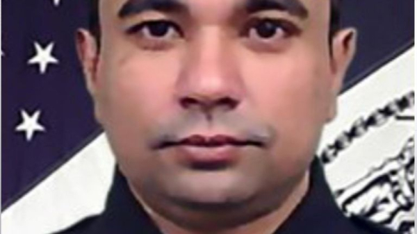 Gunman kills four including police officer at New York skyscraper - as suspect named Gunman kills four including police officer at New York skyscraper - as suspect named