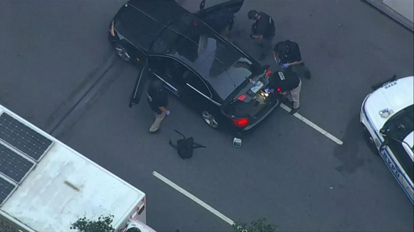 Gunman kills four including police officer at New York skyscraper - as suspect named Gunman kills four including police officer at New York skyscraper - as suspect named