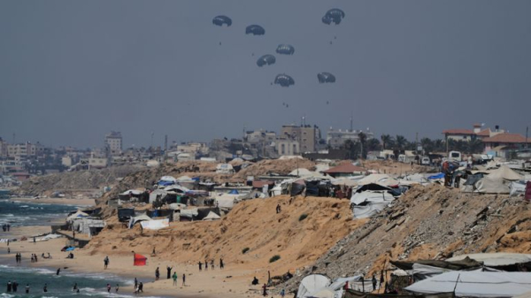 Mile after mile of grey rubble - the view from a plane dropping aid to Gaza