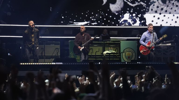 Oasis reunion: A high-five and a hug - the gestures were there, but ultimately it was all about the music Oasis reunion: A high-five and a hug - the gestures were there, but ultimately it was all about the music