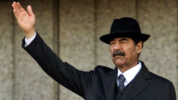 President Bush determined to 'rid world of evil-doer Saddam Hussein', new records reveal