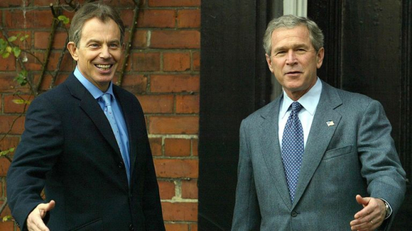 President Bush determined to 'rid world of evil-doer Saddam Hussein', new records reveal