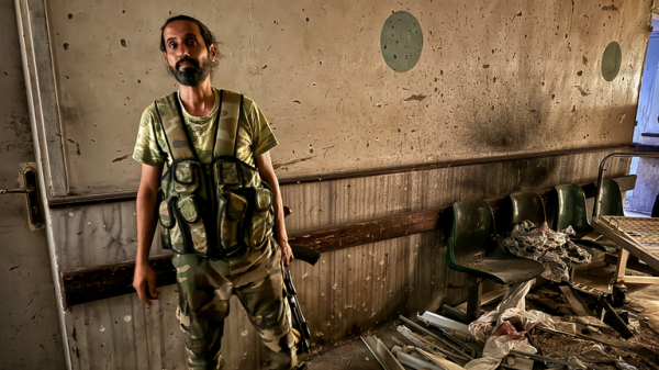 Rows of decomposing bodies that haven't been buried because of fierce fighting in Syrian city