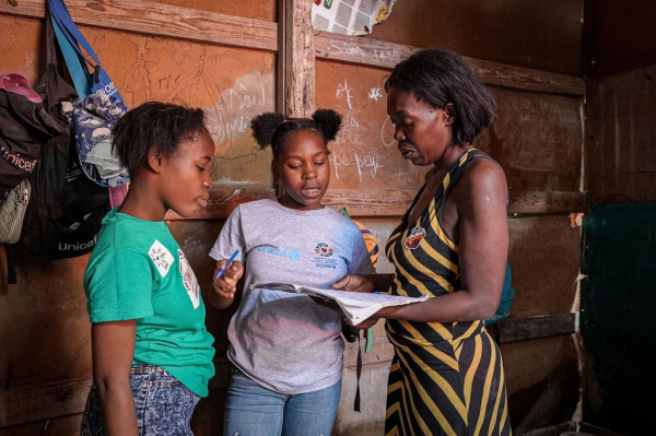 &lsquo;Do not give up on children&rsquo;: Displaced by violence, a Haitian girl finds hope at school

