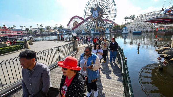 Measles exposure risk identified at major airport and theme park, health officials warn